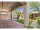 The covered brick patio and outdoor fire pit create an ideal setting for relaxation and entertainment at 7983 Texas Hills St, Las Vegas, NV 89113