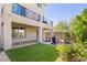 This backyard features a covered patio and outdoor seating is ideal for relaxing and entertaining at 7983 Texas Hills St, Las Vegas, NV 89113