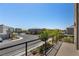 This balcony has black railings and a neighborhood view at 7983 Texas Hills St, Las Vegas, NV 89113