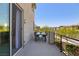 Relax on this outdoor balcony with plenty of light and an outdoor table and seating at 7983 Texas Hills St, Las Vegas, NV 89113