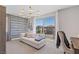 Bedroom featuring modern decor, sofa, and a view from the sliding glass door at 7983 Texas Hills St, Las Vegas, NV 89113