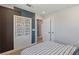 This bedroom features modern decor, paint, and a closet at 7983 Texas Hills St, Las Vegas, NV 89113
