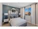 This bedroom features a basketball hoop headboard and window with curtains at 7983 Texas Hills St, Las Vegas, NV 89113