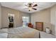 Bedroom featuring a ceiling fan, a slider to the outside and carpet flooring at 8717 Red Brook Dr # 201, Las Vegas, NV 89128