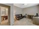 Neutral bedroom featuring a desk, carpet flooring, and futon sofa at 8717 Red Brook Dr # 201, Las Vegas, NV 89128