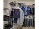 Organized walk-in closet with shelving and hanging space for clothes and accessories at 8717 Red Brook Dr # 201, Las Vegas, NV 89128