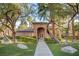 Attractive clubhouse with manicured lawn and landscaping, complete with a sidewalk entrance at 8717 Red Brook Dr # 201, Las Vegas, NV 89128