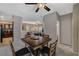 Upstairs dining area featuring a ceiling fan and a view into the living room and kitchen at 8717 Red Brook Dr # 201, Las Vegas, NV 89128