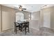 Dining area features a modern ceiling fan and a neutral paint palette at 8717 Red Brook Dr # 201, Las Vegas, NV 89128