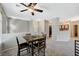 Dining area with views of the kitchen and living room at 8717 Red Brook Dr # 201, Las Vegas, NV 89128