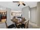 Open dining area with views to the living room and kitchen at 8717 Red Brook Dr # 201, Las Vegas, NV 89128