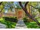 Inviting exterior of the building with well-manicured landscaping, creating a serene and welcoming atmosphere at 8717 Red Brook Dr # 201, Las Vegas, NV 89128