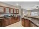 Kitchen featuring granite countertops, stainless steel appliances, and ample cabinet space at 8717 Red Brook Dr # 201, Las Vegas, NV 89128
