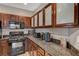 Kitchen with stainless steel appliances and beautiful granite countertops at 8717 Red Brook Dr # 201, Las Vegas, NV 89128