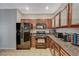 Well-equipped kitchen with stainless steel appliances and granite countertops at 8717 Red Brook Dr # 201, Las Vegas, NV 89128