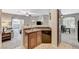 Bright living room features a sliding glass door and neutral paint colors at 8717 Red Brook Dr # 201, Las Vegas, NV 89128