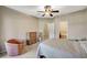 Inviting main bedroom with a ceiling fan, walk-in closet, and ensuite bathroom access at 8717 Red Brook Dr # 201, Las Vegas, NV 89128