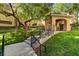 Landscaped path with covered seating area at 8717 Red Brook Dr # 201, Las Vegas, NV 89128