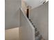 Interior stairway with carpet and white handrail at 8717 Red Brook Dr # 201, Las Vegas, NV 89128