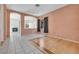 Spacious living room with neutral tones, archways, and connecting rooms for seamless flow at 8849 Pheasant Valley Way, Las Vegas, NV 89123
