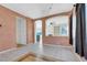 Open-concept living area features tile flooring, archways, and abundant natural light at 8849 Pheasant Valley Way, Las Vegas, NV 89123