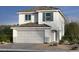 Charming two-story home with a neutral color scheme, tile roof and attached two car garage at 9240 Dekalb Ct, Las Vegas, NV 89148