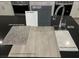 Selection of kitchen finishes includes sleek chrome faucet, quartz countertop and Brellin Grey upgraded cabinets at 9240 Dekalb Ct, Las Vegas, NV 89148