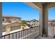 Balcony view of homes, mature trees and a clear blue sky at 965 Nevada State Dr # 41201, Henderson, NV 89002