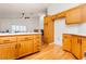 Kitchen features wood floors and view to living area at 9741 Horizon Hills Dr, Las Vegas, NV 89117