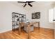 Cozy office space with hardwood floors, shelving, and shutters at 9741 Horizon Hills Dr, Las Vegas, NV 89117