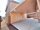 Covered patio and modern home provides an ideal space for outdoor living and entertainment at 9844 Ashton Pines Ct, Las Vegas, NV 89147