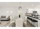 Contemporary dining room with elegant chandelier and modern table setting at 10532 Redwood Ash Ave, Las Vegas, NV 89144