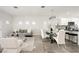 Bright and airy living room featuring modern furniture and sleek finishes at 10532 Redwood Ash Ave, Las Vegas, NV 89144