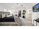 This main bedroom is bright and airy, featuring balcony access and a walk-in closet at 10532 Redwood Ash Ave, Las Vegas, NV 89144