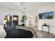 This main bedroom is bright and airy, featuring balcony access and a walk-in closet at 10532 Redwood Ash Ave, Las Vegas, NV 89144