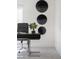 Office space features a dark desk and chair, decor and modern artwork at 10532 Redwood Ash Ave, Las Vegas, NV 89144
