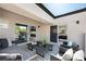Inviting covered patio with comfortable seating and access to interior living spaces at 10532 Redwood Ash Ave, Las Vegas, NV 89144