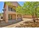 Home featuring a covered patio, balcony, and xeriscaped backyard at 11816 Orense Dr, Las Vegas, NV 89138