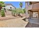 Private backyard with retaining walls, ideal for outdoor entertaining and relaxation at 11816 Orense Dr, Las Vegas, NV 89138