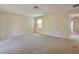 Bright bedroom with natural light, neutral paint, and carpeted floor at 11816 Orense Dr, Las Vegas, NV 89138