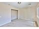 Bedroom features carpet, a window with blinds, and a closet at 11816 Orense Dr, Las Vegas, NV 89138