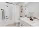 Bathroom featuring a shower with white subway tile, a modern vanity, and neutral color tones at 129 Barton Bay Ave, North Las Vegas, NV 89031