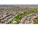Panoramic aerial view of a suburban neighborhood showcases well-maintained homes and green spaces at 1387 Minuet St, Henderson, NV 89052