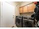 Convenient laundry area equipped with modern washer and dryer at 1387 Minuet St, Henderson, NV 89052