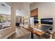 Office with views of the pool and access to the living room at 1387 Minuet St, Henderson, NV 89052