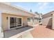 Exterior view of the backyard patio with a sliding glass door that brings the inside out at 1505 Irene Dr, Boulder City, NV 89005