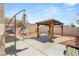 Outdoor space featuring a gazebo, a desert landscape, and hardscape at 1505 Irene Dr, Boulder City, NV 89005