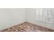 Cozy bedroom with bright window and wood-look flooring at 1505 Irene Dr, Boulder City, NV 89005
