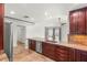 This kitchen features a ceiling fan, tile flooring and stainless steel appliances at 1505 Irene Dr, Boulder City, NV 89005