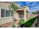 The backyard includes a covered patio, sliding glass doors, and a low-maintenance yard at 161 Cabo Cruces Dr, Henderson, NV 89011